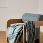 Überwurf «Rosslare» aus Lammwolle – Türkisblaues Tartanmuster